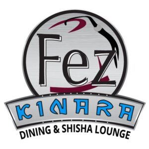 Logo restoran menampilkan tulisan "Fez" besar di dalam lingkaran perak bergaris, pita abu-abu di bawah bertuliskan "KINARA" berwarna biru, dan teks kecil "Dining & Shisha Lounge".